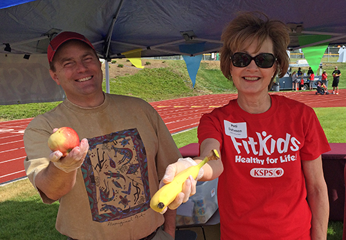 Staff Member Jason Miller and Board President Pati Dahmen help out on FitKids Day Jason Miller and Pati Dahmen help out on FitKids Day