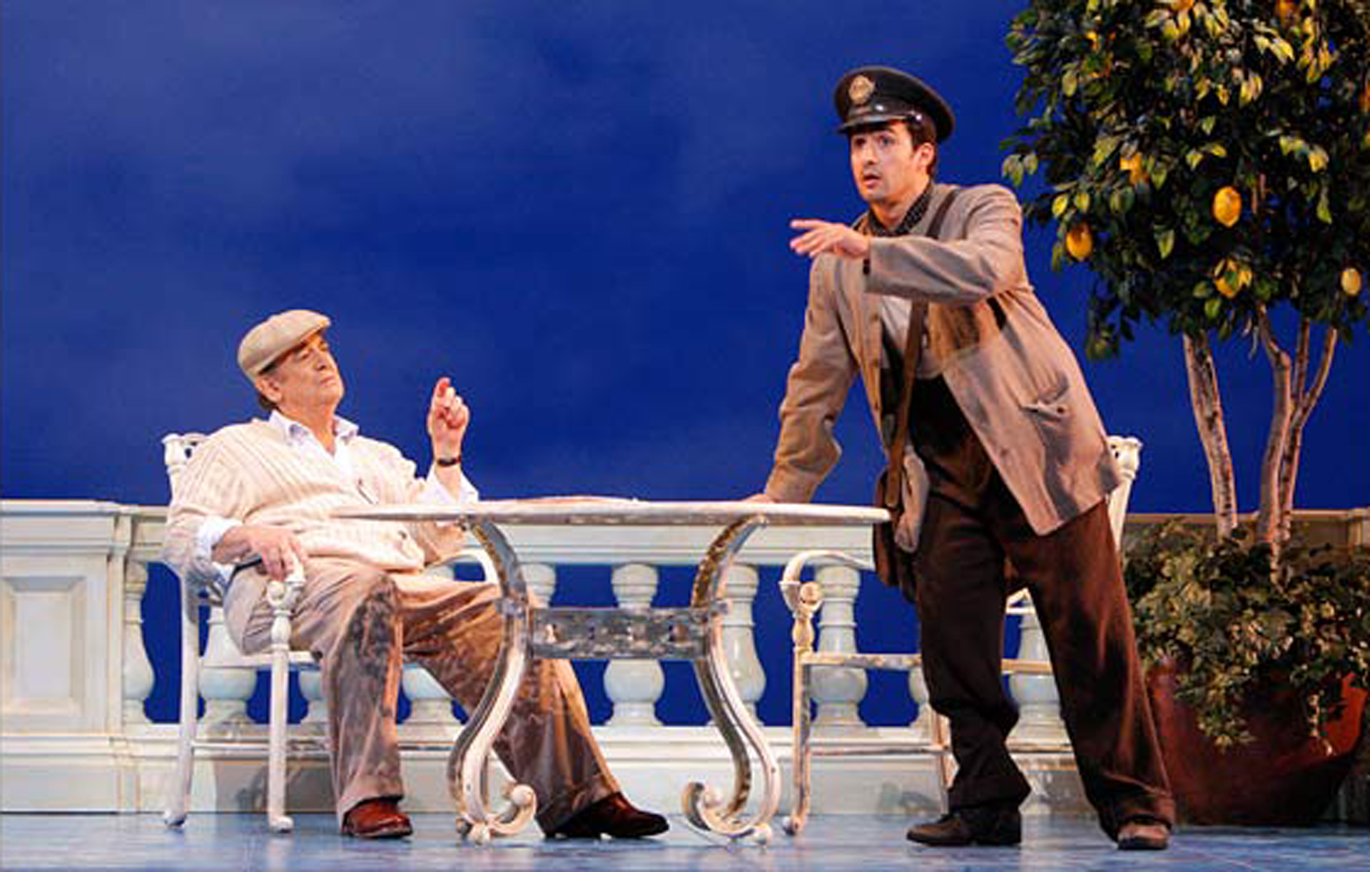 Plácido Domingo as Pablo Neruda and Charles Castronovo as Mario Ruoppolo in Il Postino. Plácido Domingo as Pablo Neruda and Charles Castronovo as Mario Ruoppolo in Il Postino.