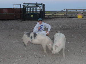 Mitch Ward shows off two of his favorite pigs Mitch Ward shows off two of his favorite pigs