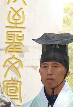 Man wearing ceremonial clothing