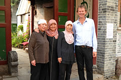 Michael Wood standing with 3 women
